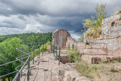 Old ruin building against cloudy sky