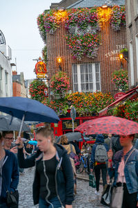 People on street in city