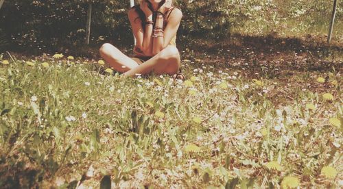 Woman standing on field