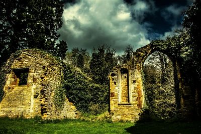 Built structure against cloudy sky