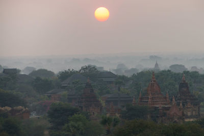 High angle view of temple against sky during sunset