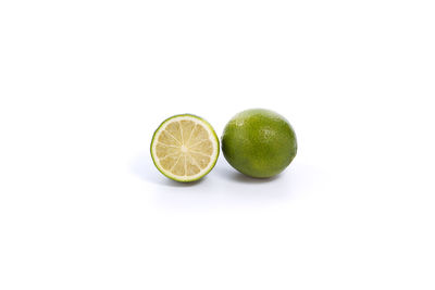 Close-up of fruits against white background