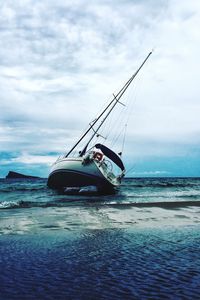 Ship on sea against sky