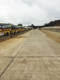 View of road against cloudy sky