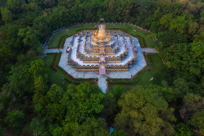 Aerial view of temple in forest
