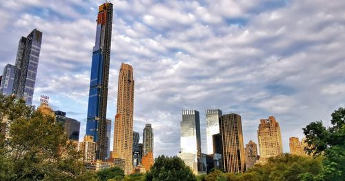 Modern buildings against sky in city