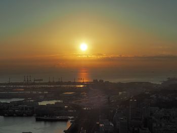 High angle view of cityscape against sky during sunset