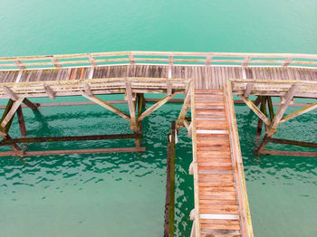 High angle view of swimming pool by sea against sky