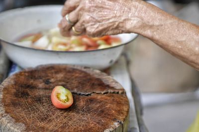 Close-up of person preparing food