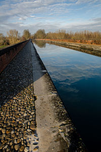 Surface level of railroad track against sky