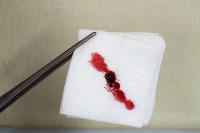 Close up of white textile with blood
