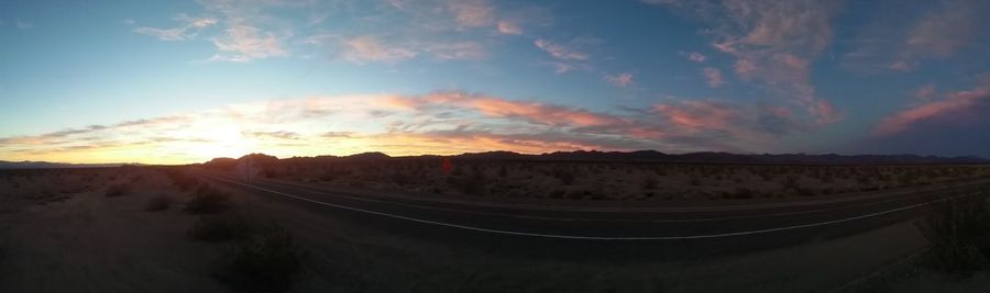 Scenic view of landscape at sunset