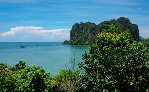 Scenic view of sea against blue sky