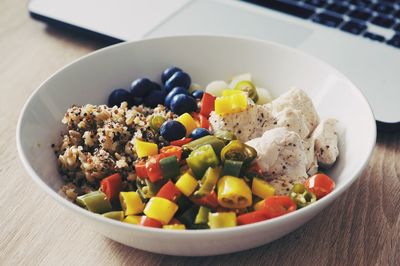 High angle view of fruits in bowl on table