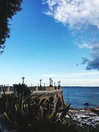 Scenic view of sea against blue sky