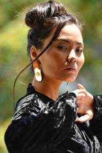 Young woman blowing bubbles