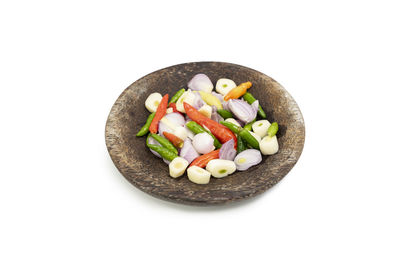 High angle view of fruit salad on white background