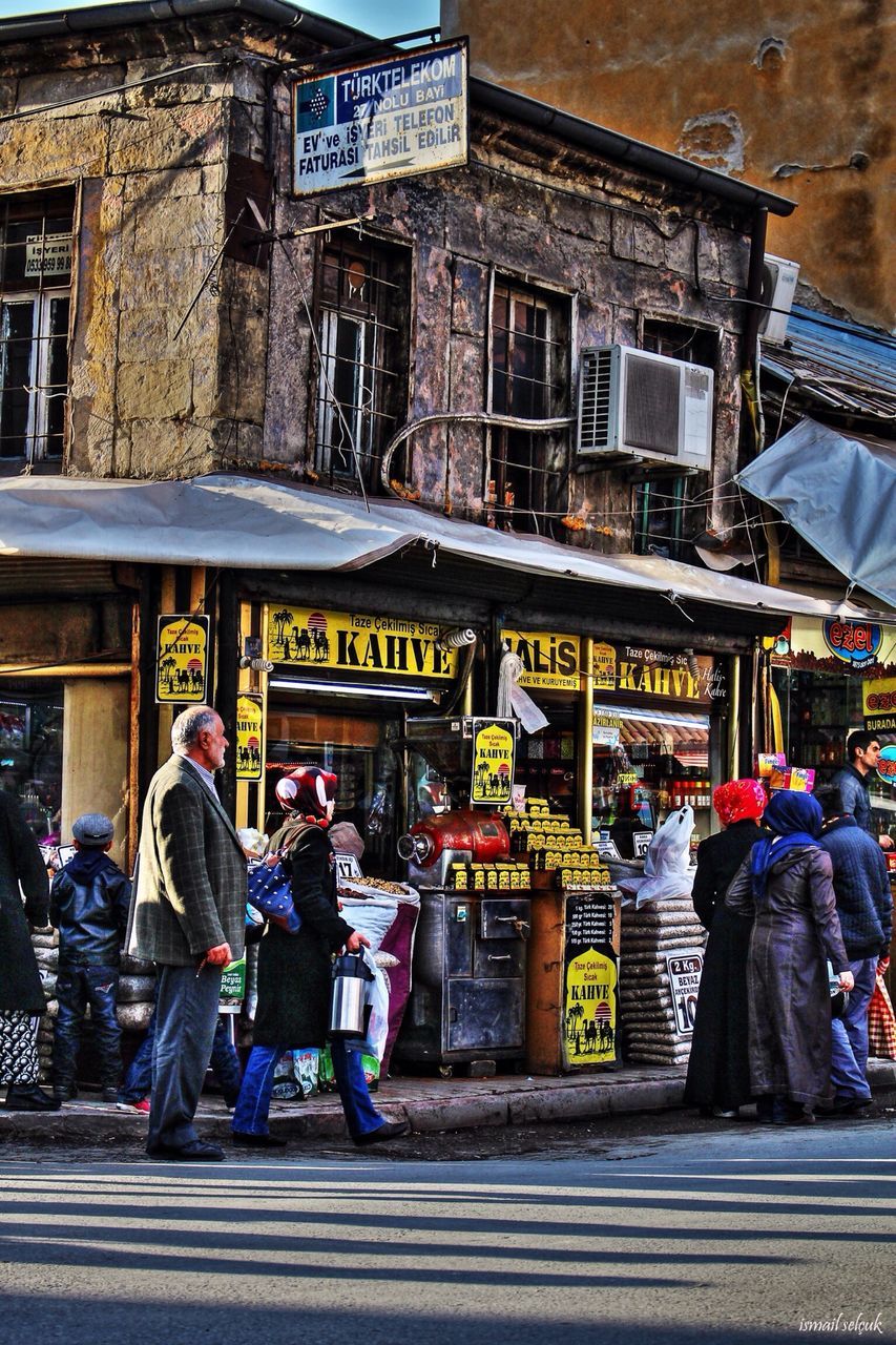 building exterior, architecture, built structure, men, person, street, lifestyles, city, city life, market, large group of people, walking, leisure activity, store, market stall, retail, casual clothing, outdoors, day