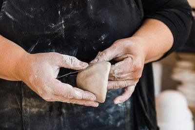 Midsection of woman preparing food