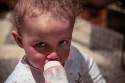 Portrait of cute boy eating food