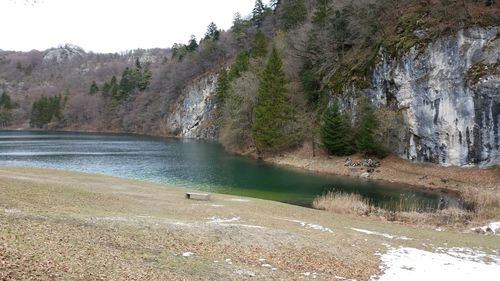 Scenic view of river and mountains