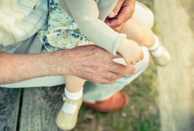 High angle view of woman holding hands