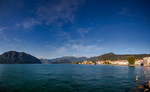 Scenic view of sea against blue sky