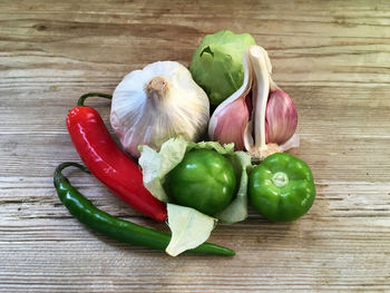 Close-up of bell peppers on wooden table