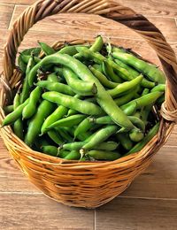 High angle view of vegetables in basket on table