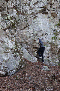 Full length of man standing on rock