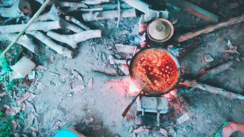 High angle view of fire on barbecue grill