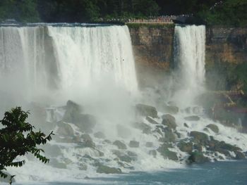 Scenic view of waterfall in forest