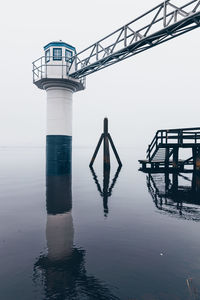 Pier over sea against sky
