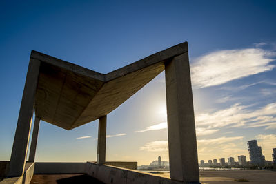 Cropped built structure against blue sky