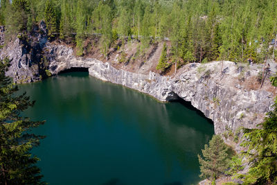 High angle view of rocks in lake