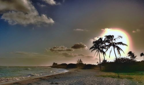 Scenic view of sea against sky at sunset