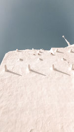 Scenic view of snow covered land against sky