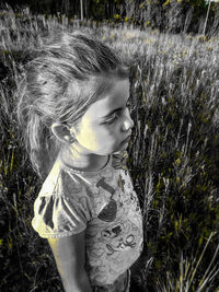 Close-up of girl with grass