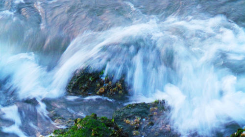 Water splashing on rocks