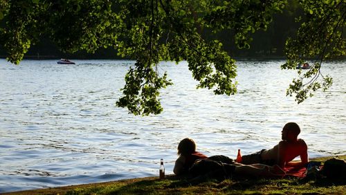 People relaxing in lake