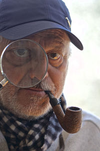 Close-up portrait of man wearing hat