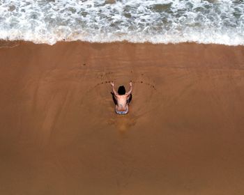 High angle view of man on beach