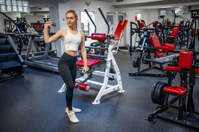 Low section of man exercising in gym