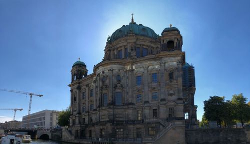 Berlin cathedral against clear blue sky in city