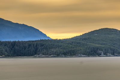 Scenic view of landscape against sky during sunset