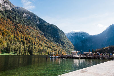 Scenic view of lake and mountains against sky