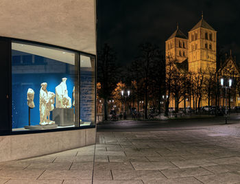 Illuminated statue of building at night