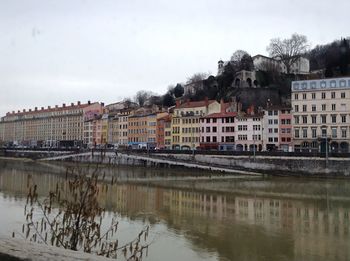 View of river with buildings in background