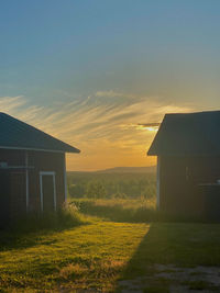 House on field against sky