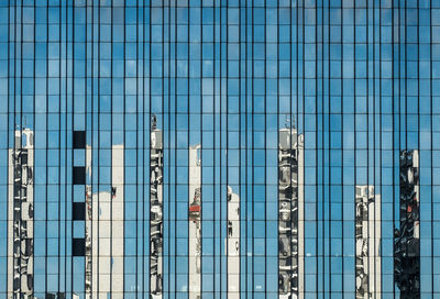 Reflection of buildings on glass